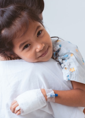 Young relaxed girl being carried with IV to prepare for anesthesia.